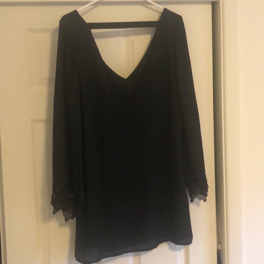 Black shift dress with lace bell sleeves